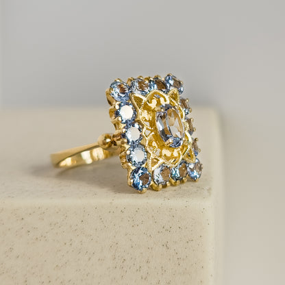 Vintage gold ring made of 18 carat yellow gold cast with blue gemstones