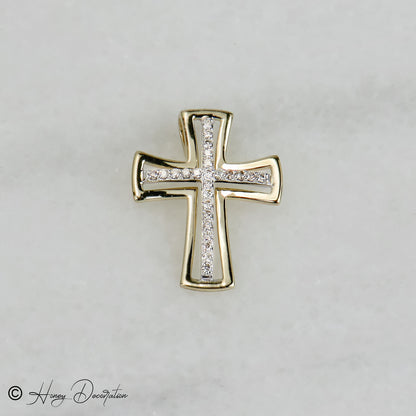Noble cross pendant made of 14 carat gold with diamond trimmings