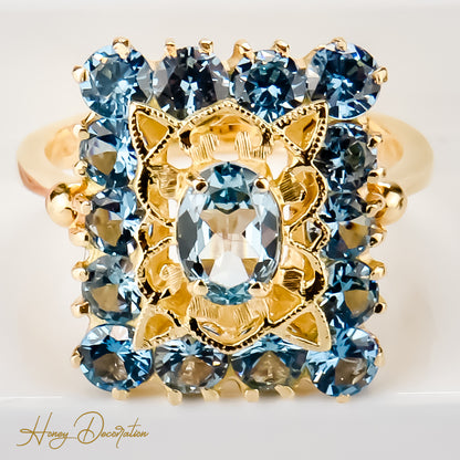 Vintage Goldring aus 18 Karat Gelbgold besetzt mit blauen Edelsteinen