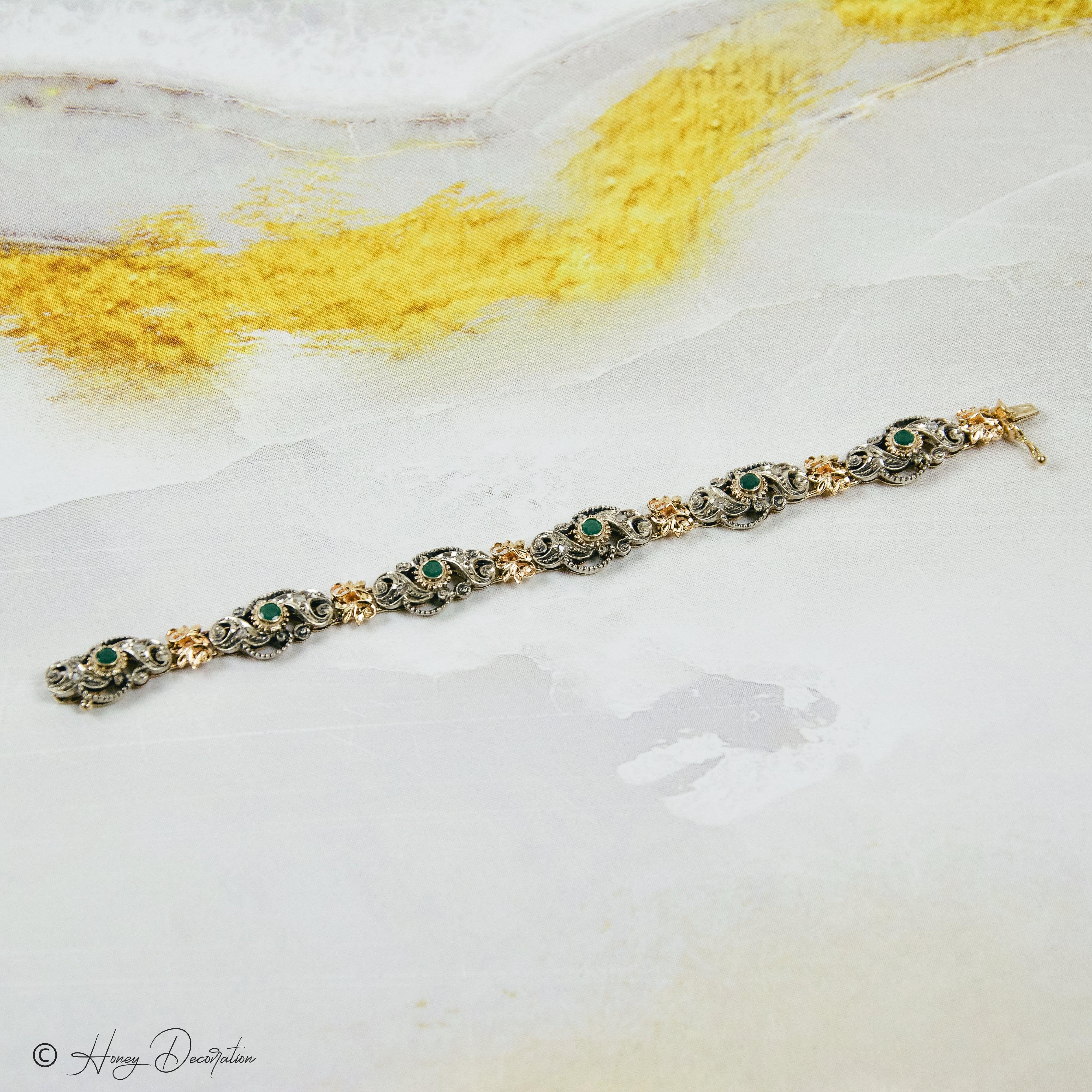 Armband aus 585 Gold und Silber mit Smaragden und Diamantrosen - Honey Decoration