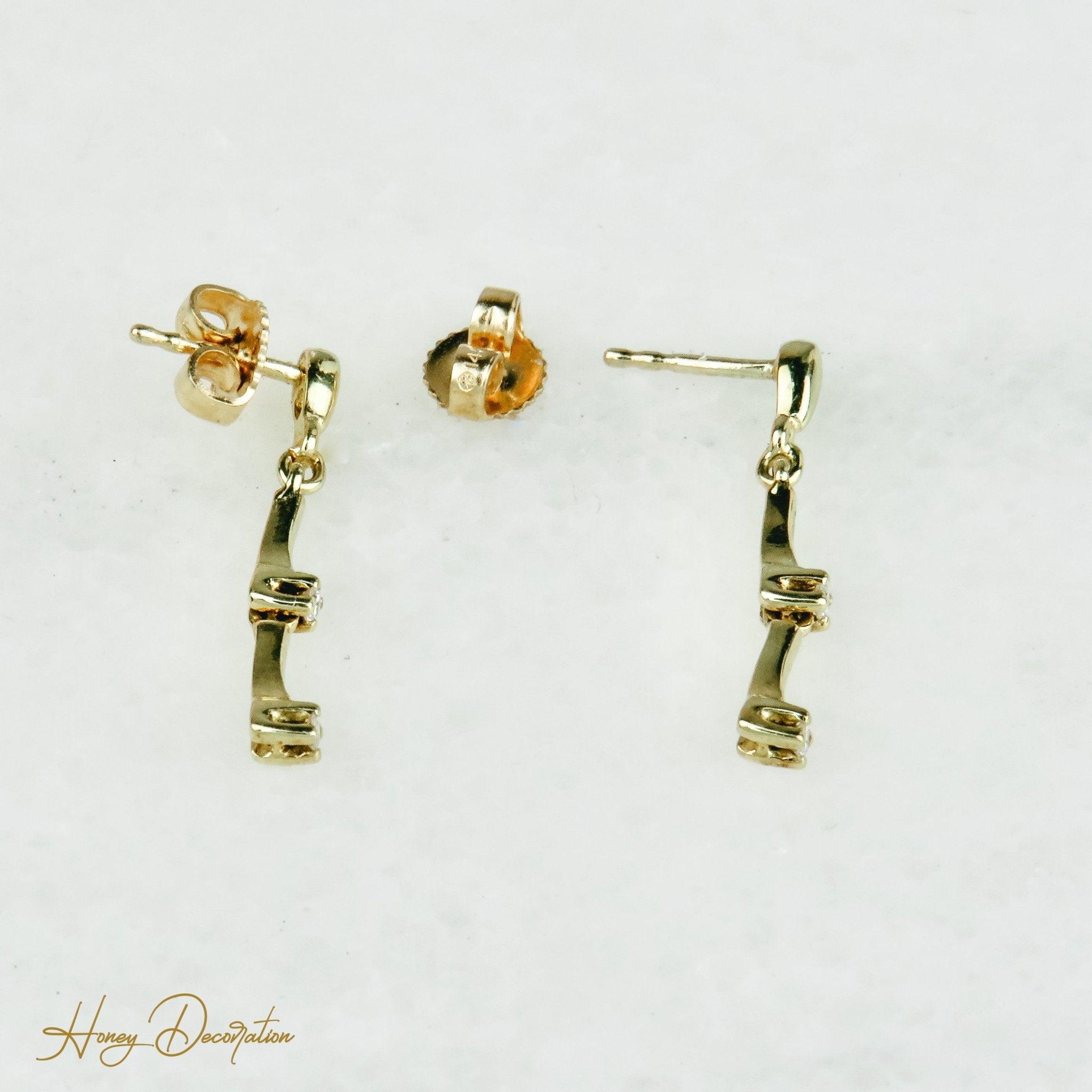 Elegante Goldohrringe mit Diamanten - Honey Decoration