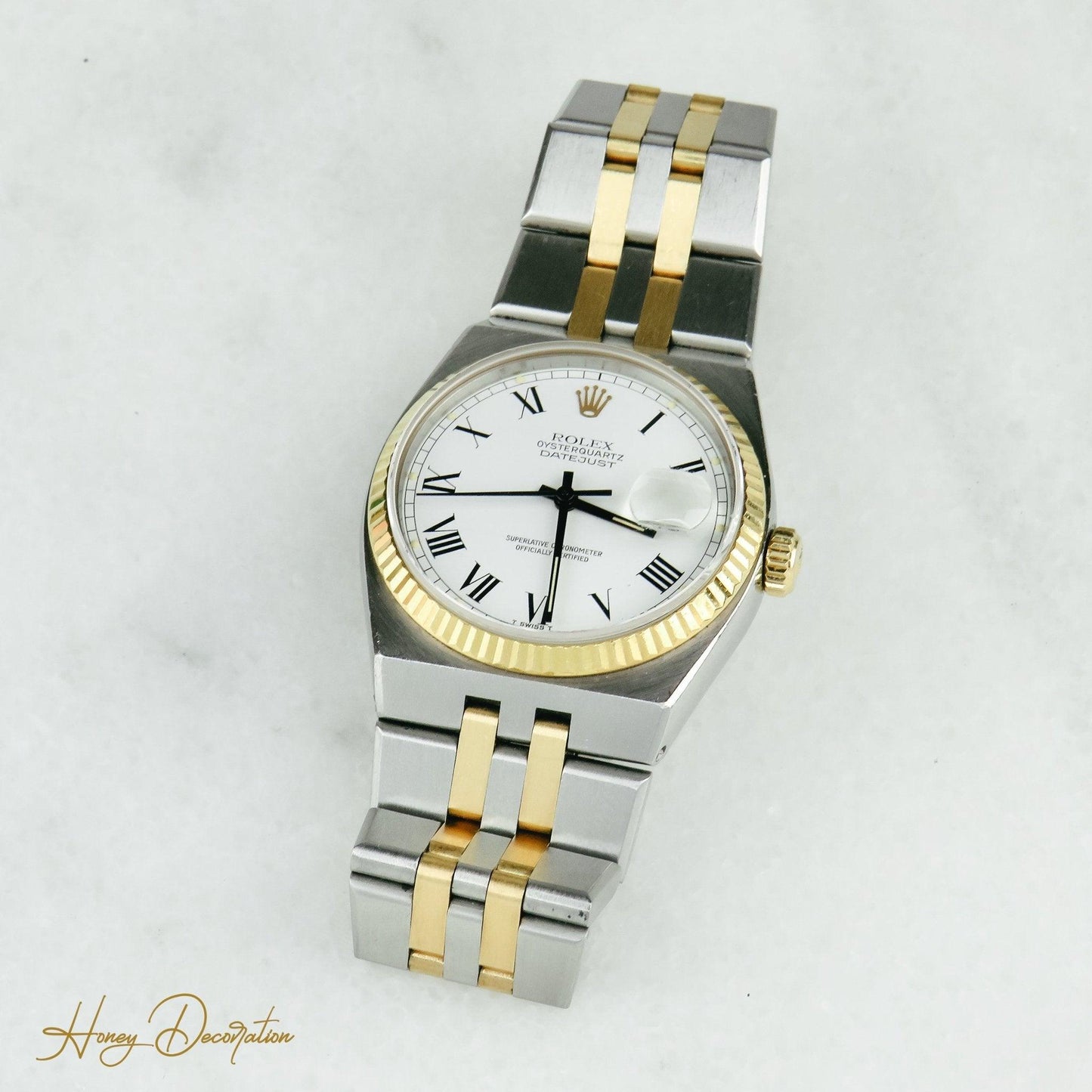 Rolex Date Just Quarz Stahl / Gold - Honey Decoration