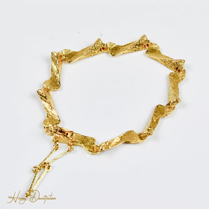 Stylisches Lapponia Design-Armband aus 14 Karat Gold - Honey Decoration